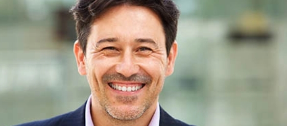 Seymour Dental Associates PLLC man smiling after cosmetic dental service